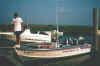 tomboat.jpg (21070 bytes)